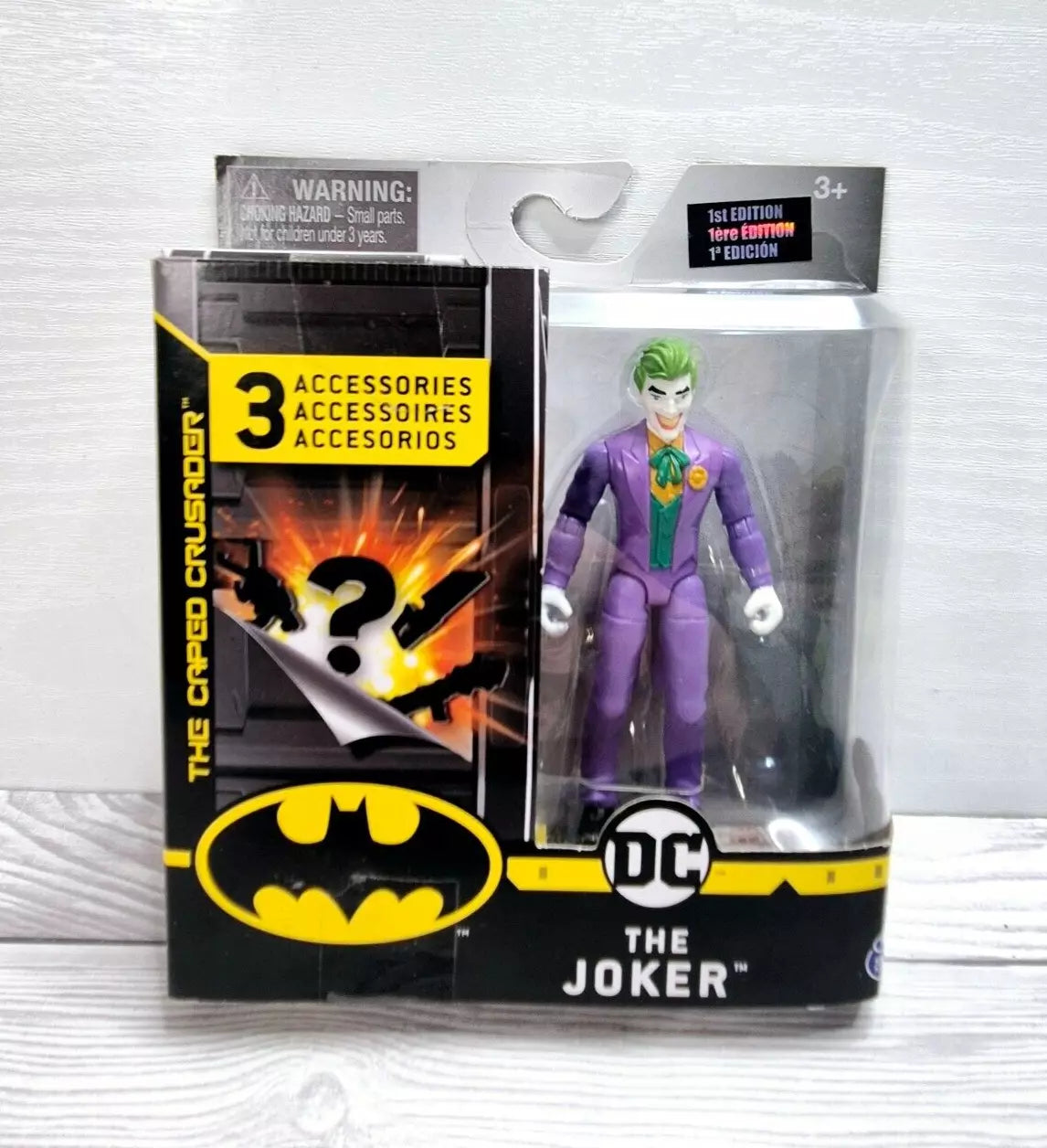 DC BATMAN, 4-Inch The Joker Action Figure with 3 Mystery Accessories